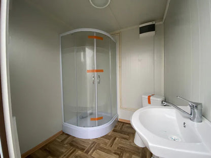 Sanitaire container in houten design met afvalbak