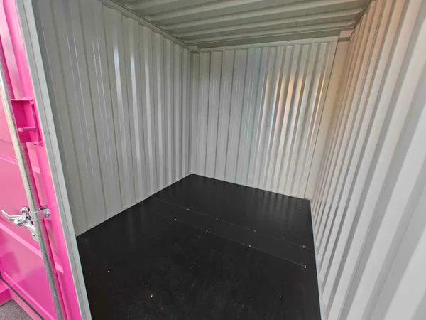 Gebruikte roze container van 3 meter